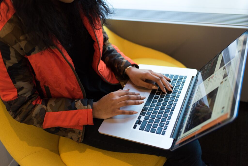 An Indian woman working on her laptop