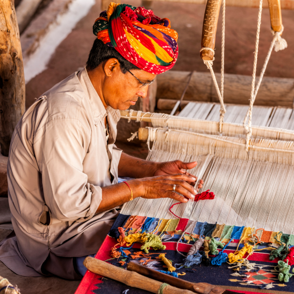 Artisan weaving cloth
