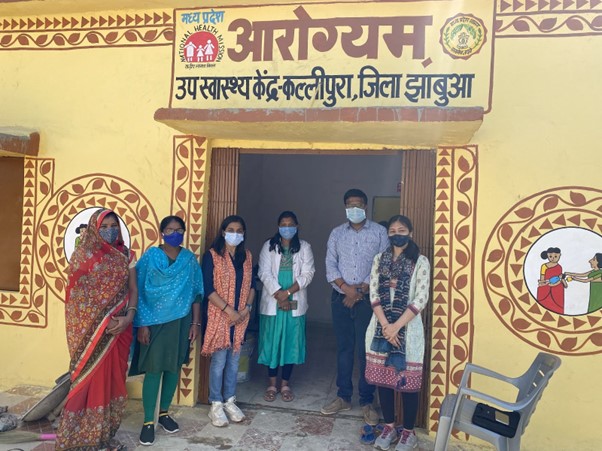 People standing in front of Aarogyam in Madya Pradesh