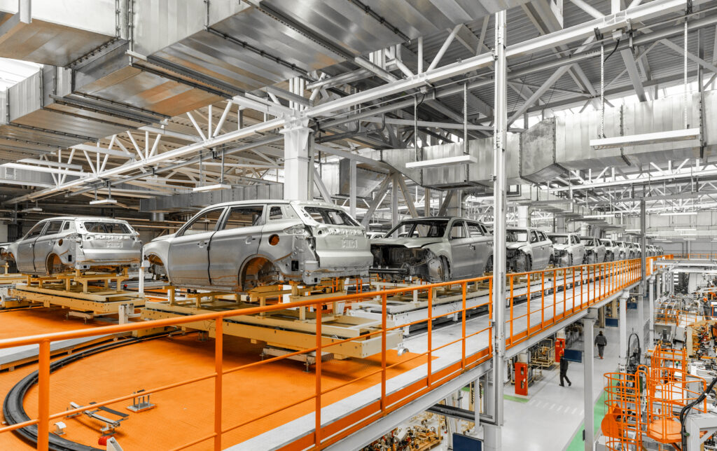 Automobile production line. Welding car body. Modern car assembly plant