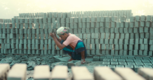 Worker working in a brick making facility