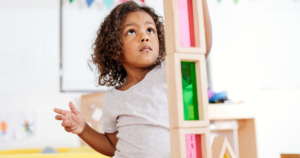 Child playing with building blocks